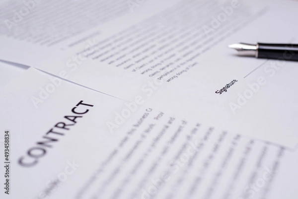 Obraz Close up of hand writing on contract 