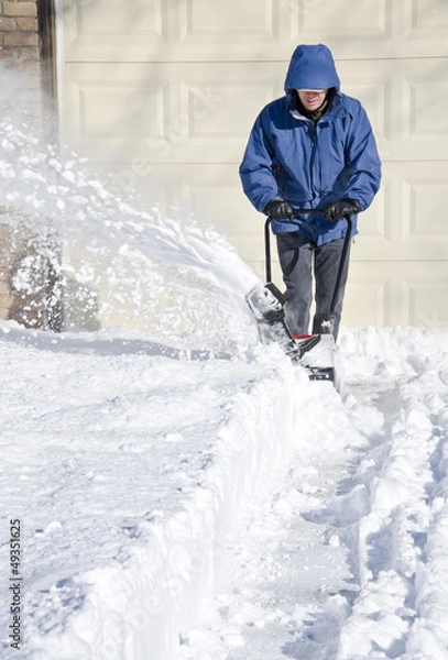 Obraz Man Using Snowblower to Clear Snow