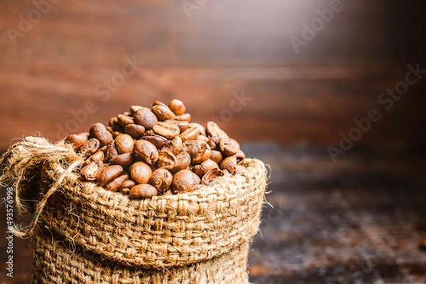Obraz .Roasted coffee beans in brown sacks