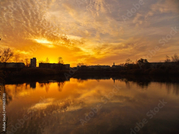 Fototapeta sunset over the river