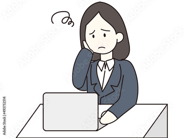 Obraz 困り顔でパソコンをする女性　ビジネス　スーツ　人物