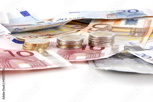 Obraz Münzstapel mit Scheinen