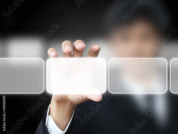 Obraz Business man holding touch screen