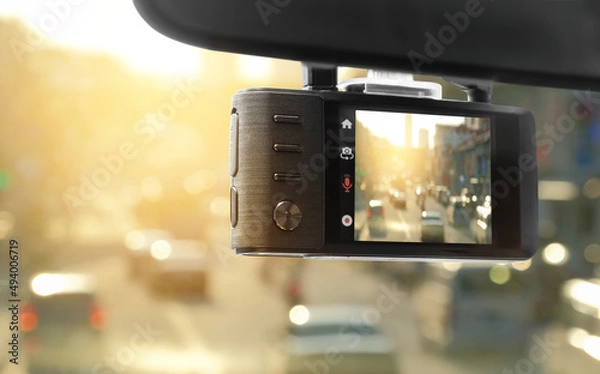 Fototapeta Digital video recorder car camera for safety on the road accident, Technology recorder device capturing video of front of vehicle automobile crash safety proof evidence.