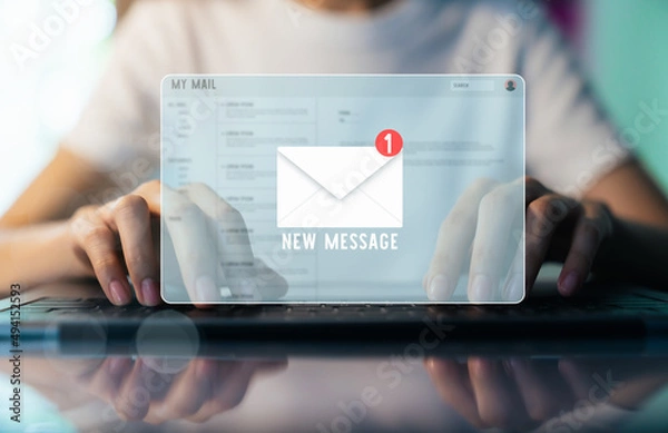 Fototapeta Woman had using laptop show email screen on application mobile in the office.