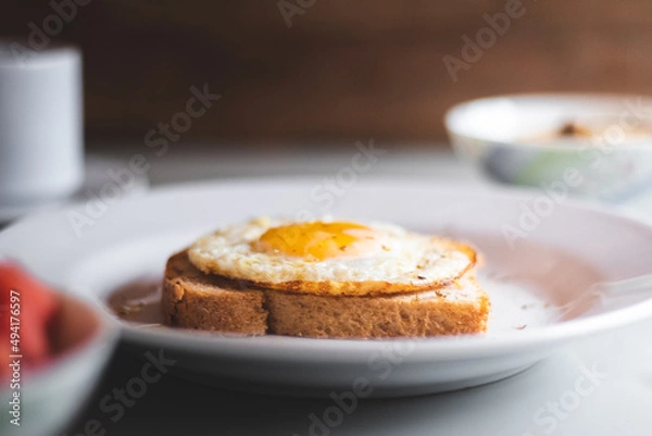 Fototapeta healthy breakfast with egg and toasts