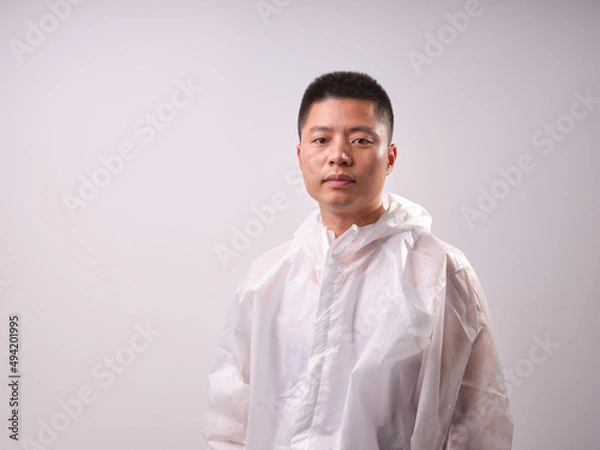 Obraz A man in protective clothing ...