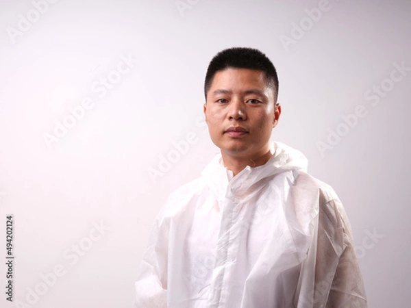 Obraz A man in protective clothing ...
