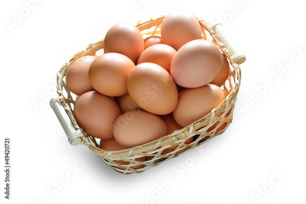 Obraz Eggs in basket, isolate on white