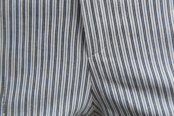 Fototapeta Close up image of striped fabric garment.