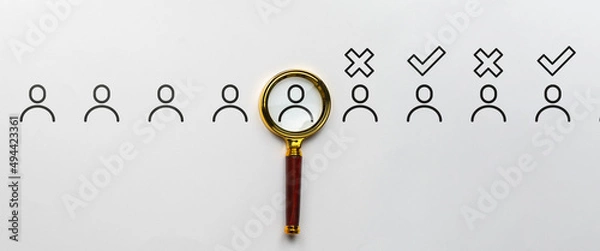 Fototapeta Selection of job candidates. Magnifying glass with abstract personas. Acceptance and rejection.