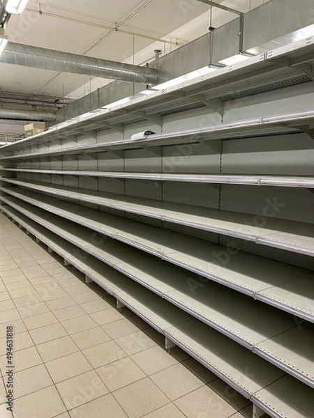 Obraz St. Petersburg, Russia, 03.11.2022, local supermarket, empty shelves of shops with products. Default, price increase, local goods, consumption, life in Russia, store closures, default 
