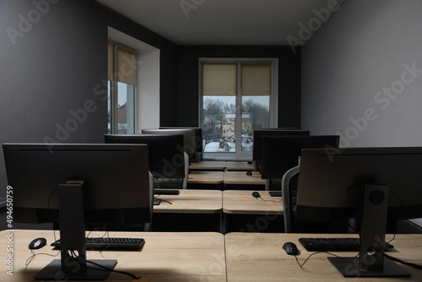 Fototapeta Many modern computers in open space office