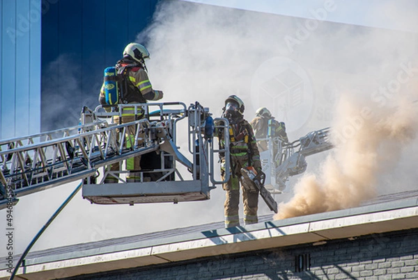 Obraz firefighters fighting fire