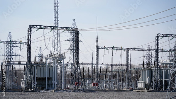 Fototapeta Electrical substation - electrical installation. Reception, conversion and distribution of electrical energy, transformers and other converters of electrical energy. 
