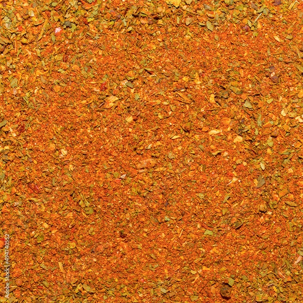 Obraz Photo of closeup texture of orange spice for meat and chicken and other food, background