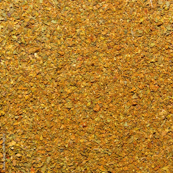 Obraz Photo of closeup texture of orange spice for meat and chicken, background