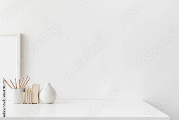 Obraz White desk with empty space. Bright stylish and minimal workspace.