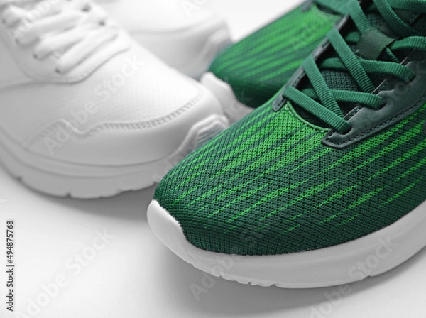 Obraz Sport shoes for running on white background closeup