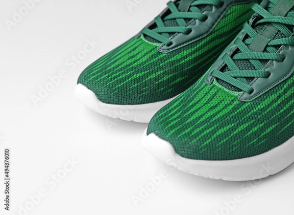 Obraz Sport shoes for running on white background closeup