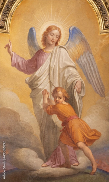 Obraz ROME, ITALY - AUGUST 28, 2021: The fresco of Guardian angel in church Chiesa di San Francesco Saverio by unknown artist. of 19. cent.