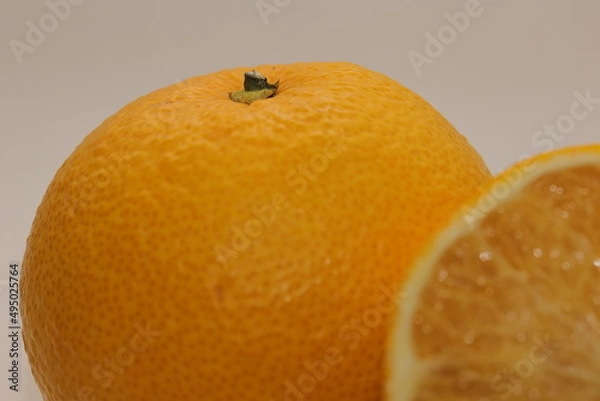 Obraz 日本の「八朔」という名のオレンジ、半分にカットした果物