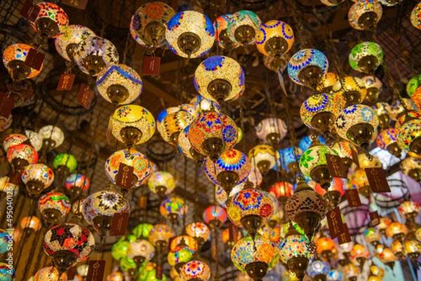 Fototapeta bright colored multi-colored lanterns hang on the ceiling