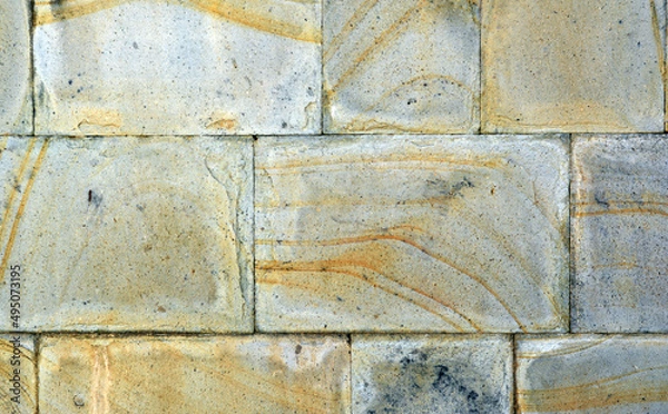 Fototapeta Beautiful dilapidated solid stone wall