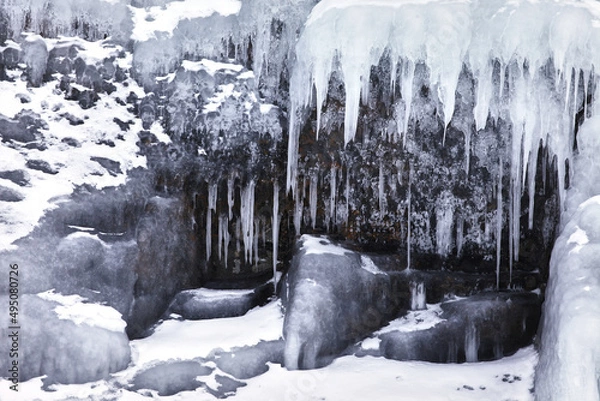 Fototapeta Frozen splash water on Baikal lake. Abstract winter background. Amazing scenery with frozen water