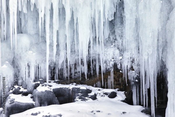 Fototapeta Frozen splash water on Baikal lake. Abstract winter background. Amazing scenery with frozen water