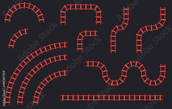 Fototapeta Train track set. Curved railroad isolated on background. Transportation and railway concept. DIY set of railway tracks in different shapes.