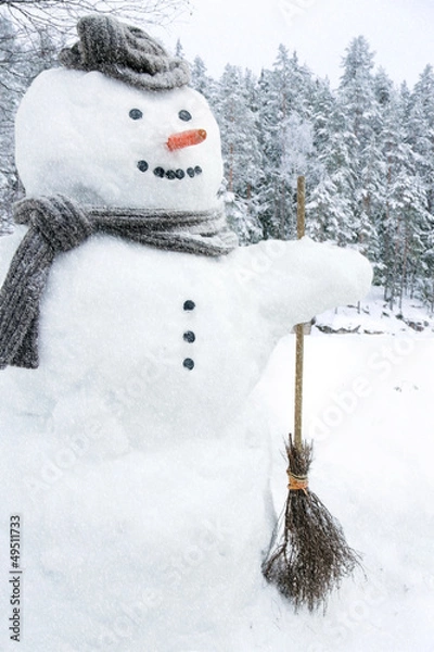 Obraz Snowman outside in snowfall