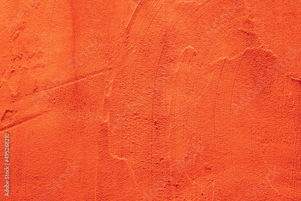 Fototapeta abstract orange grunge cement or concrete wall texture background Red cement wall texture for interior design for background The concept of rough, bright and rough skin.