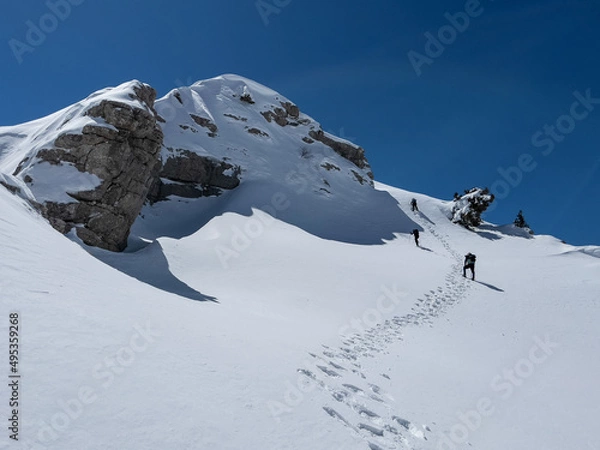 Fototapeta exploratory hiking in the mystical, mysterious and adventurous mountains of the professional team