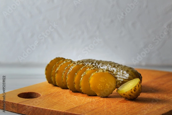 Fototapeta Pickled cucumbers in a jar.