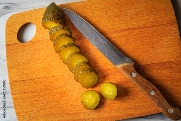 Fototapeta Pickled cucumbers in a jar.