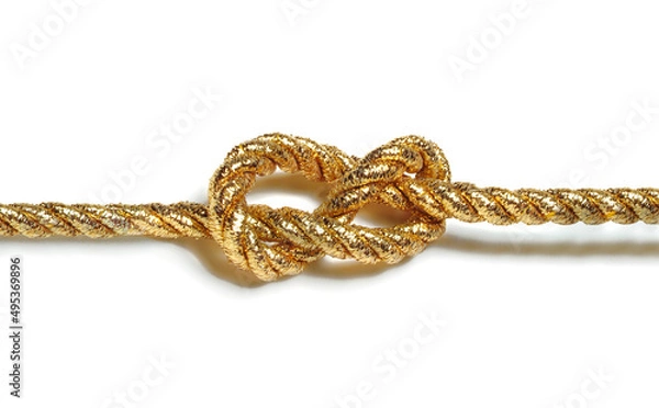 Fototapeta golden rope with knot isolated on white