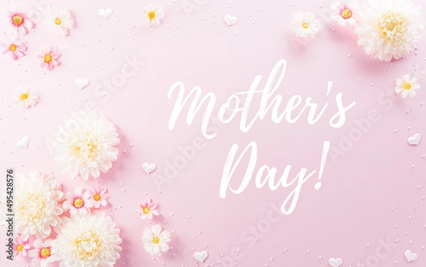 Fototapeta Happy Mother's Day decoration concept made from flowers and the text on pink pastel background.