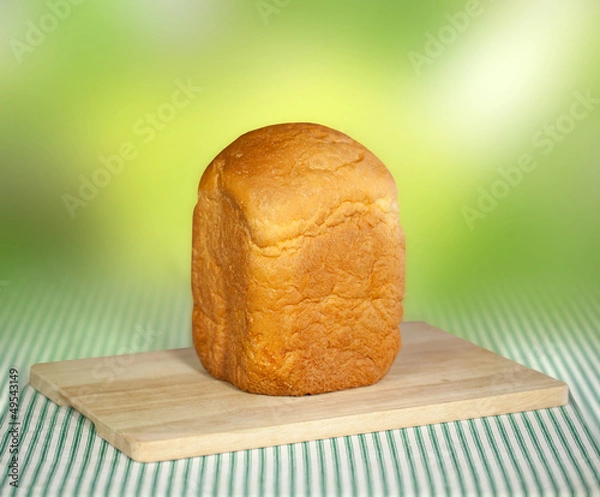 Fototapeta Bread machine making fresh bread at home.