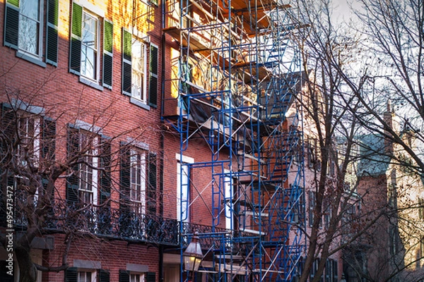 Obraz classic New England Boston brownstone building with forged fire escape street view