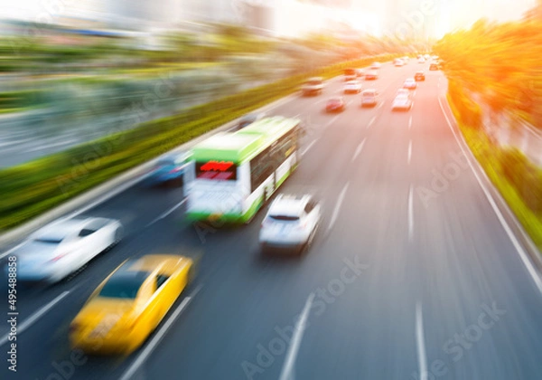 Fototapeta Traffic with motion blur on the street road