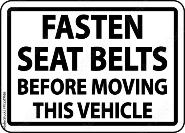 Fototapeta Fasten Belts Before Moving Label Sign On White Background