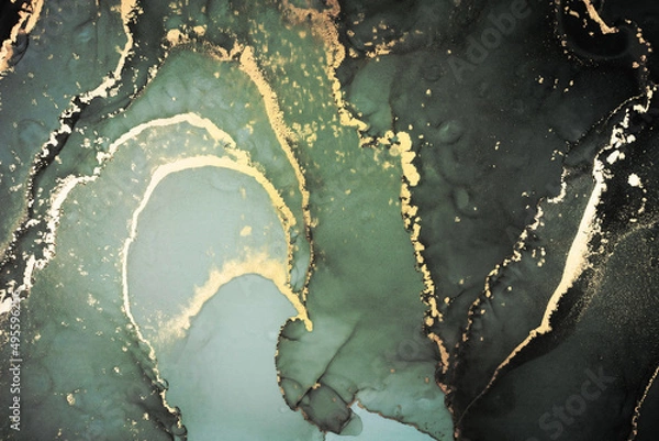 Fototapeta Luxury abstract fluid art painting in alcohol ink technique, mixture of black, gray and gold paints. Imitation of marble stone cut, glowing golden veins. Tender and dreamy design.