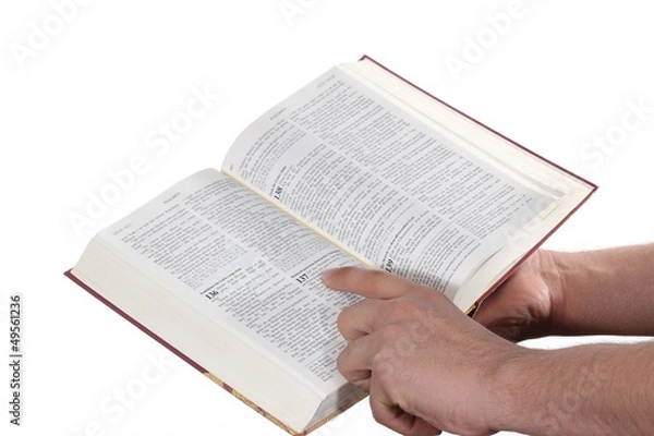 Obraz Praying hand hold an open bible