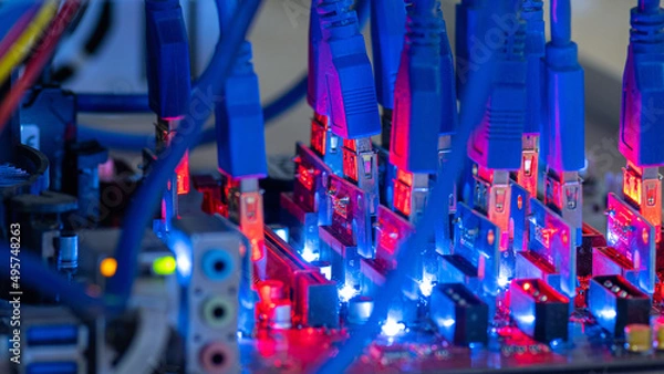 Obraz Neon LED backlight on motherboard for cryptocurrency mining using crypto farm. Production of electronic cryptocurrency with help of computer technologies.