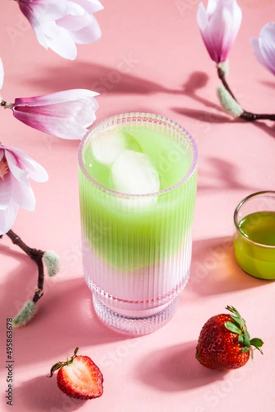Obraz Strawberry matcha latte in a glass cup.