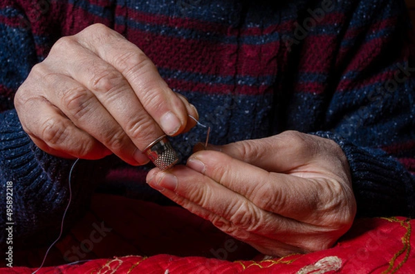 Obraz tailor and fine workmanship in their hands