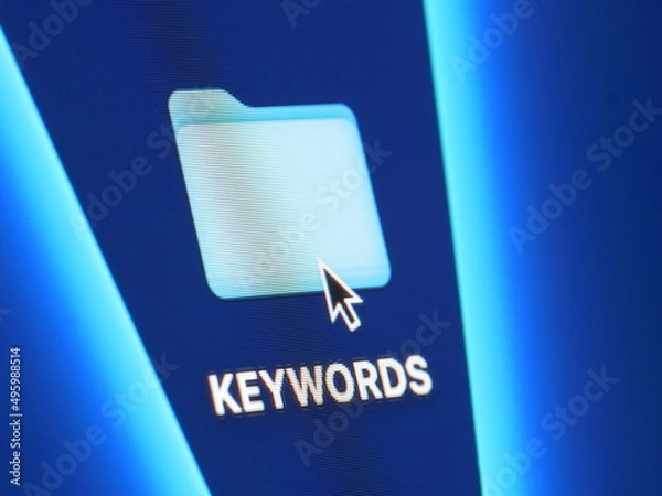 Fototapeta Keywords - macro shot of folder on computer desktop with mouse pointer - zooming in on screen pixels