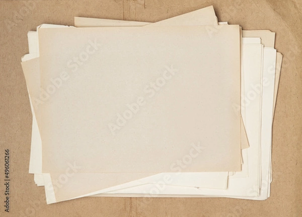 Fototapeta Folder with old yellowed paper sheets.