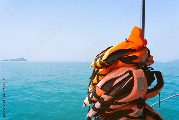 Obraz Stack of life jackets for boat. 